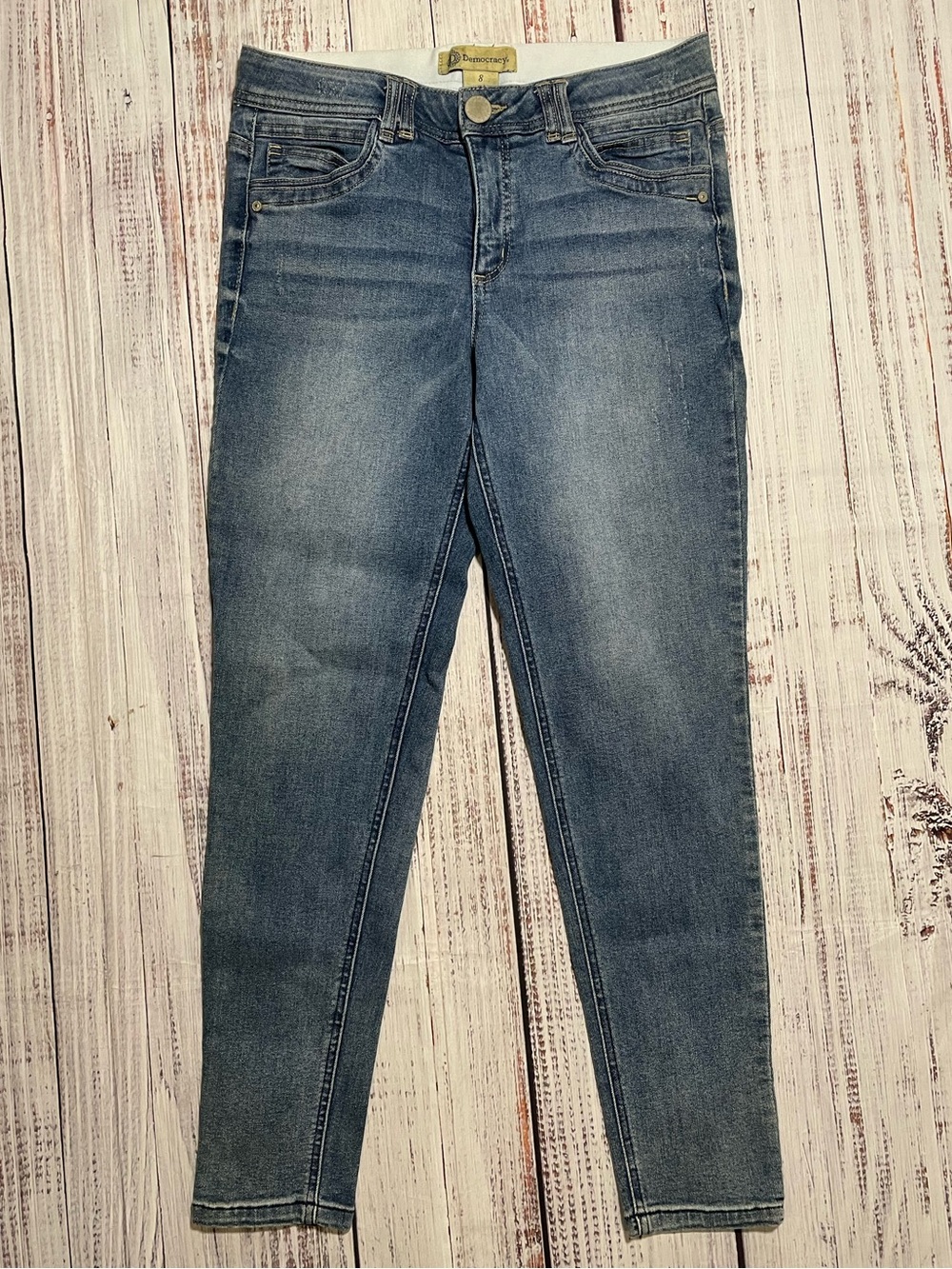 Democracy women's blue mid-wash jeans featuring AB Technology. Size 8.